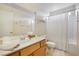 Bathroom featuring a vanity, a toilet, a shower with a curtain, and tiled floors at 1066 Vanlier Ln, Henderson, NV 89015