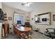 Bedroom with a desk, chair, and window at 1066 Vanlier Ln, Henderson, NV 89015