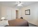 A simple bedroom with a comfortable bed and essential furniture at 1066 Vanlier Ln, Henderson, NV 89015