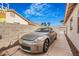 Exterior view of a paved driveway and car, showcasing the property's curb appeal and parking space at 1066 Vanlier Ln, Henderson, NV 89015