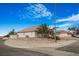 Corner lot single story home with block wall, mature landscaping and a two car garage at 1066 Vanlier Ln, Henderson, NV 89015