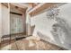 Inviting front entry with tiled floor, security door and decorative sun decor at 1066 Vanlier Ln, Henderson, NV 89015