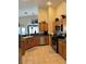 Traditional kitchen featuring granite countertops, stainless steel appliances, and oak cabinetry at 1066 Vanlier Ln, Henderson, NV 89015