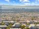 Enjoy the city and mountain views from this home nestled within a vibrant neighborhood with palm tree-lined streets at 10830 Space Odyssey Ave, Las Vegas, NV 89129