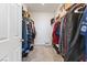 Walk-in closet with shelving and hanging space for efficient organization at 10830 Space Odyssey Ave, Las Vegas, NV 89129