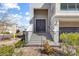 Beautiful front porch with double doors, leading to desert-friendly landscaping at 10830 Space Odyssey Ave, Las Vegas, NV 89129