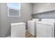 Practical laundry room with appliances and storage at 10830 Space Odyssey Ave, Las Vegas, NV 89129