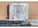 Custom water feature with marble backdrop and stone base adding elegance to the outdoor space at 10830 Space Odyssey Ave, Las Vegas, NV 89129