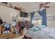 Bedroom with natural light and a ceiling fan, creating a relaxing space at 1133 Mount Olympias Ct, Las Vegas, NV 89110
