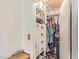 Walk-in closet with ample storage space, shelving, and hanging racks at 1133 Mount Olympias Ct, Las Vegas, NV 89110