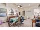 Dining room featuring unique furnishings, tile floors, and ample natural light at 1133 Mount Olympias Ct, Las Vegas, NV 89110