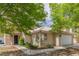 Inviting single-story home with desert landscaping, covered entry, and attached two-car garage at 1133 Mount Olympias Ct, Las Vegas, NV 89110