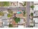 Aerial view of a home with a private pool in the backyard, surrounded by lush greenery at 1200 I Ave, Boulder City, NV 89005