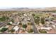 An aerial view of the community with tree lined streets, parks, and tennis courts at 1200 I Ave, Boulder City, NV 89005