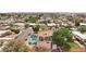 Aerial view of a home with a sparkling pool and lush greenery in backyard at 1200 I Ave, Boulder City, NV 89005
