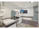 Bathroom with a soaking tub, dual sinks, black countertops, and a sleek design at 1200 I Ave, Boulder City, NV 89005