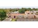 Charming two-story home with an American flag, well-maintained yard, and a cozy patio area at 1200 I Ave, Boulder City, NV 89005