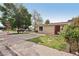 Charming single-story home with a red door and a well-maintained front yard at 1200 I Ave, Boulder City, NV 89005