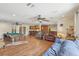 Spacious living room featuring hardwood floors, a pool table, and comfortable seating area at 1200 I Ave, Boulder City, NV 89005