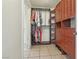 Spacious walk-in closet with custom shelving, ample storage, and tiled floors at 1200 I Ave, Boulder City, NV 89005