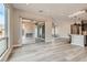 Open floor plan showcasing the living room, kitchen, and sliding glass doors to the patio at 138 Crimson Cactus Ave, Henderson, NV 89011