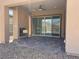 Covered patio featuring brick flooring, a ceiling fan, a fireplace and mountain views at 138 Crimson Cactus Ave, Henderson, NV 89011