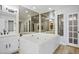 Bathroom features a luxurious soaking tub and modern fixtures at 1410 E Serene Ave, Las Vegas, NV 89123