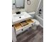 Elegant bathroom vanity featuring matte black hardware and convenient storage drawers at 1410 E Serene Ave, Las Vegas, NV 89123