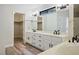 Bathroom features a dual vanity and modern fixtures at 1410 E Serene Ave, Las Vegas, NV 89123