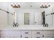 Bathroom features a dual vanity with modern fixtures at 1410 E Serene Ave, Las Vegas, NV 89123