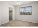 Bedroom featuring plush carpet and a closet at 1410 E Serene Ave, Las Vegas, NV 89123