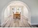 Elegant dining room featuring a chandelier and a large window for natural light at 1410 E Serene Ave, Las Vegas, NV 89123
