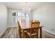 Dining room featuring wood table and chairs with a chandelier at 1410 E Serene Ave, Las Vegas, NV 89123