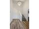 Bright foyer featuring hardwood floors, high ceilings, and stylish chandelier at 1410 E Serene Ave, Las Vegas, NV 89123