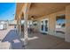 Covered patio with elegant arches, ideal for outdoor dining and relaxation at 1410 E Serene Ave, Las Vegas, NV 89123