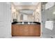 Elegant bathroom featuring a double sink vanity and glass-enclosed shower at 145 E Harmon Ave # 2411, Las Vegas, NV 89109