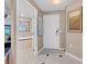Bathroom featuring double doors to a luxurious soaking tub and a separate water closet at 145 E Harmon Ave # 2411, Las Vegas, NV 89109