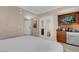 Stylish bedroom with a kitchenette, modern amenities, and plenty of storage at 145 E Harmon Ave # 2411, Las Vegas, NV 89109