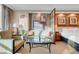 Comfortable bedroom with sitting area, attractive artwork, and upscale decor at 145 E Harmon Ave # 2411, Las Vegas, NV 89109