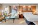Comfortable bedroom featuring a large bed, sitting area, and sophisticated design at 145 E Harmon Ave # 2411, Las Vegas, NV 89109