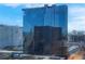 Exterior shot of a high-rise building with a reflective glass facade at 145 E Harmon Ave # 2411, Las Vegas, NV 89109