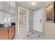 The entryway of the unit leads to a bathroom that features a soaking tub and glass enclosed shower at 145 E Harmon Ave # 2411, Las Vegas, NV 89109