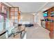 Living room area with comfortable seating, kitchenette, and a relaxing ambiance at 145 E Harmon Ave # 2411, Las Vegas, NV 89109
