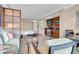 Bright living room with kitchenette, sofa, and dining area at 145 E Harmon Ave # 2411, Las Vegas, NV 89109