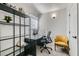 Well-lit home office featuring a modern desk, comfortable chair, and ample storage space at 1645 Chestnut St, Henderson, NV 89011