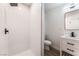 Stylish bathroom showcases a tiled shower, sleek vanity, and modern fixtures at 1648 J St, Las Vegas, NV 89106
