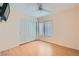 Bright bedroom featuring a ceiling fan, natural light, and a double-door closet at 1751 Juniper Twig Ave, Las Vegas, NV 89183