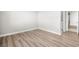 Bedroom featuring hardwood floors and ensuite bathroom at 1800 Edmond St # 226, Las Vegas, NV 89146