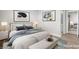 Comfortable bedroom boasts a luxurious bed, soft lighting, and a serene atmosphere with ensuite access at 1800 Edmond St # 226, Las Vegas, NV 89146