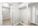 Hallway featuring cabinets and access to other rooms at 1800 Edmond St # 226, Las Vegas, NV 89146